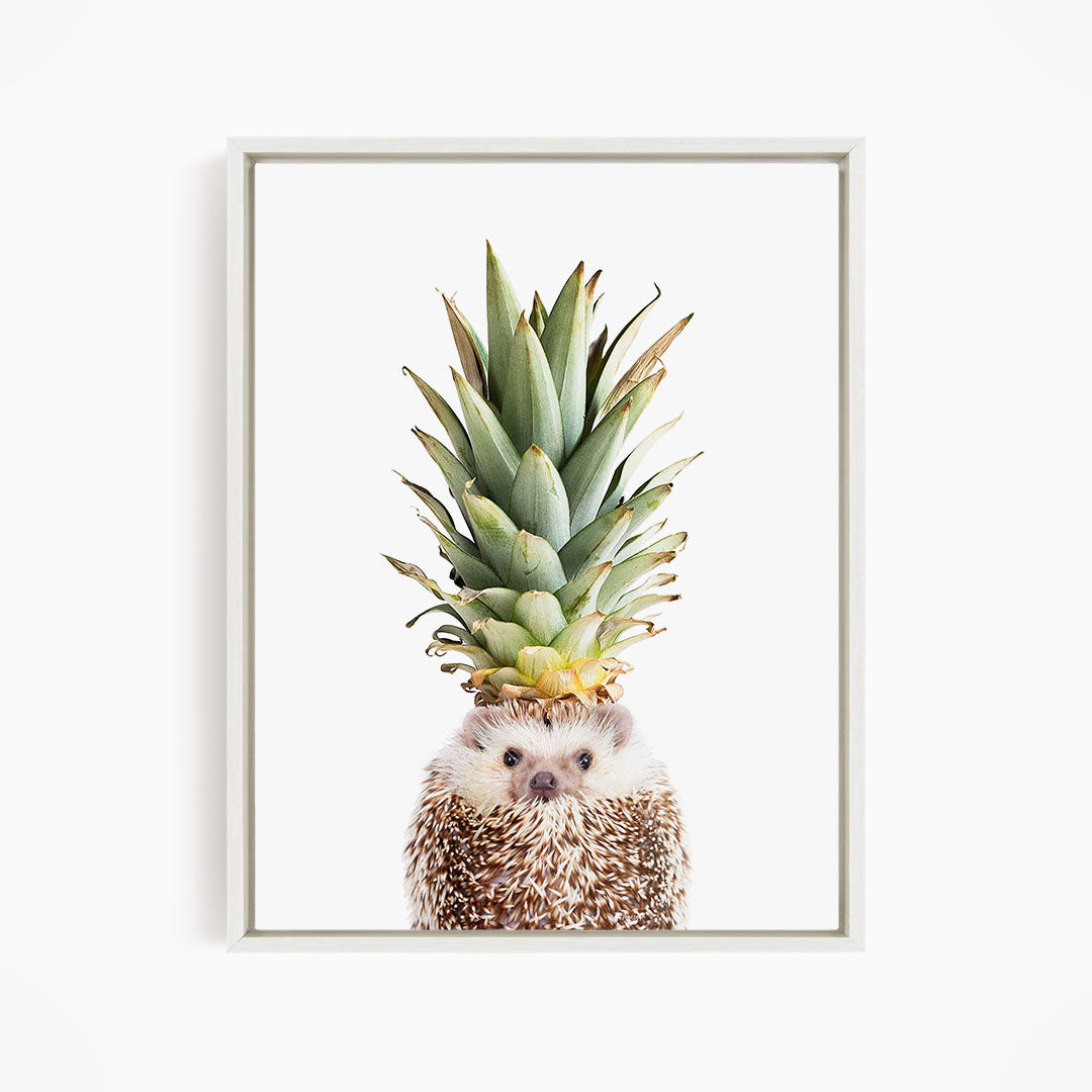 A hedgehog wearing a pineapple crown, with the pineapple's spiky green leaves and yellow fruit.