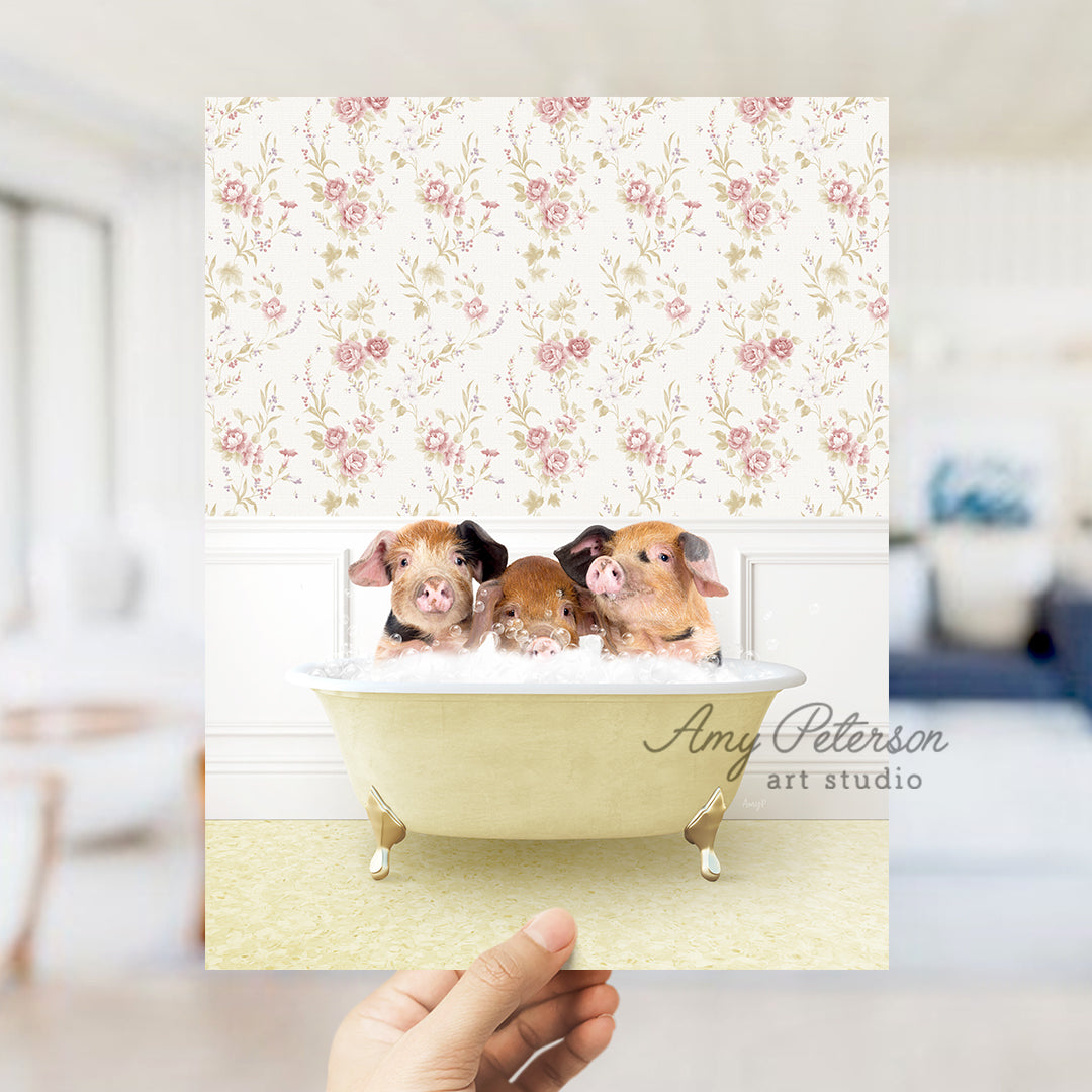 a person holding up a card with three small dogs in a bathtub