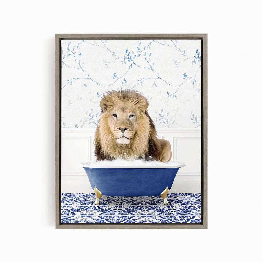A lion sitting in a blue bathtub filled with bubbles, surrounded by a blue and white patterned rug.
