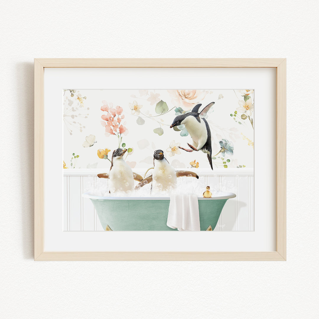 A framed image depicting three penguins enjoying a relaxing bath in a green tub, surrounded by a floral background.