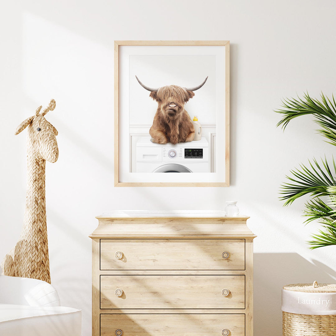 a picture of a brown dog is hanging on a wall above a dresser
