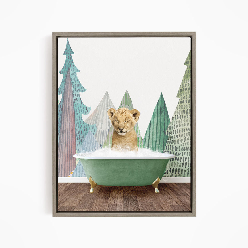 A young lion cub is sitting in a green bathtub, surrounded by a forest-themed background with trees and foliage.