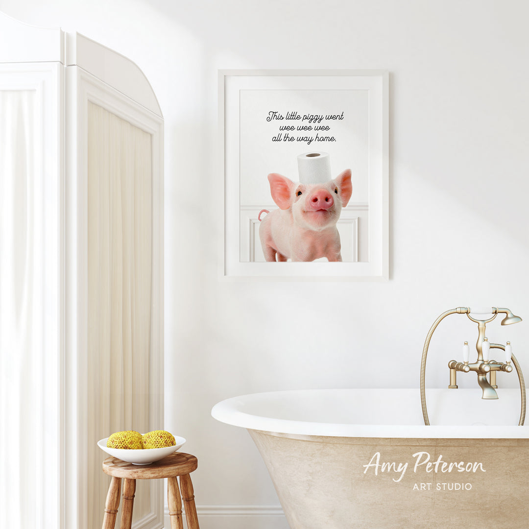 a bathroom with a white bathtub, a wooden stool, and a framed picture of a pig on the wall.