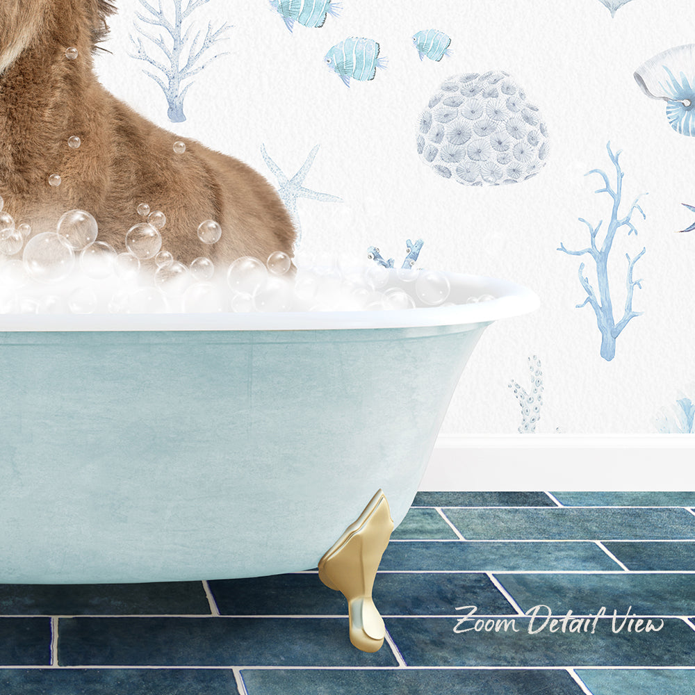 A dog is sitting in a bathtub filled with bubbles, surrounded by a blue and white ocean-themed wallpaper.