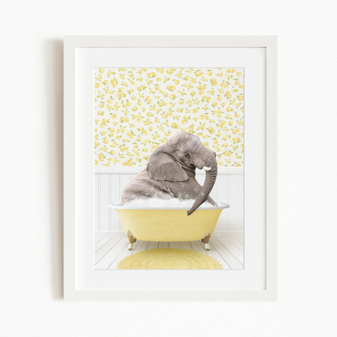 A gray elephant is sitting in a yellow bathtub filled with bubbles, surrounded by a yellow and white floral patterned wall.
