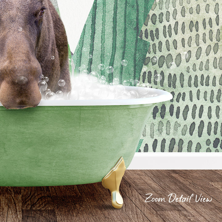 A dog is standing in a green bathtub filled with bubbles, with a patterned wall in the background.