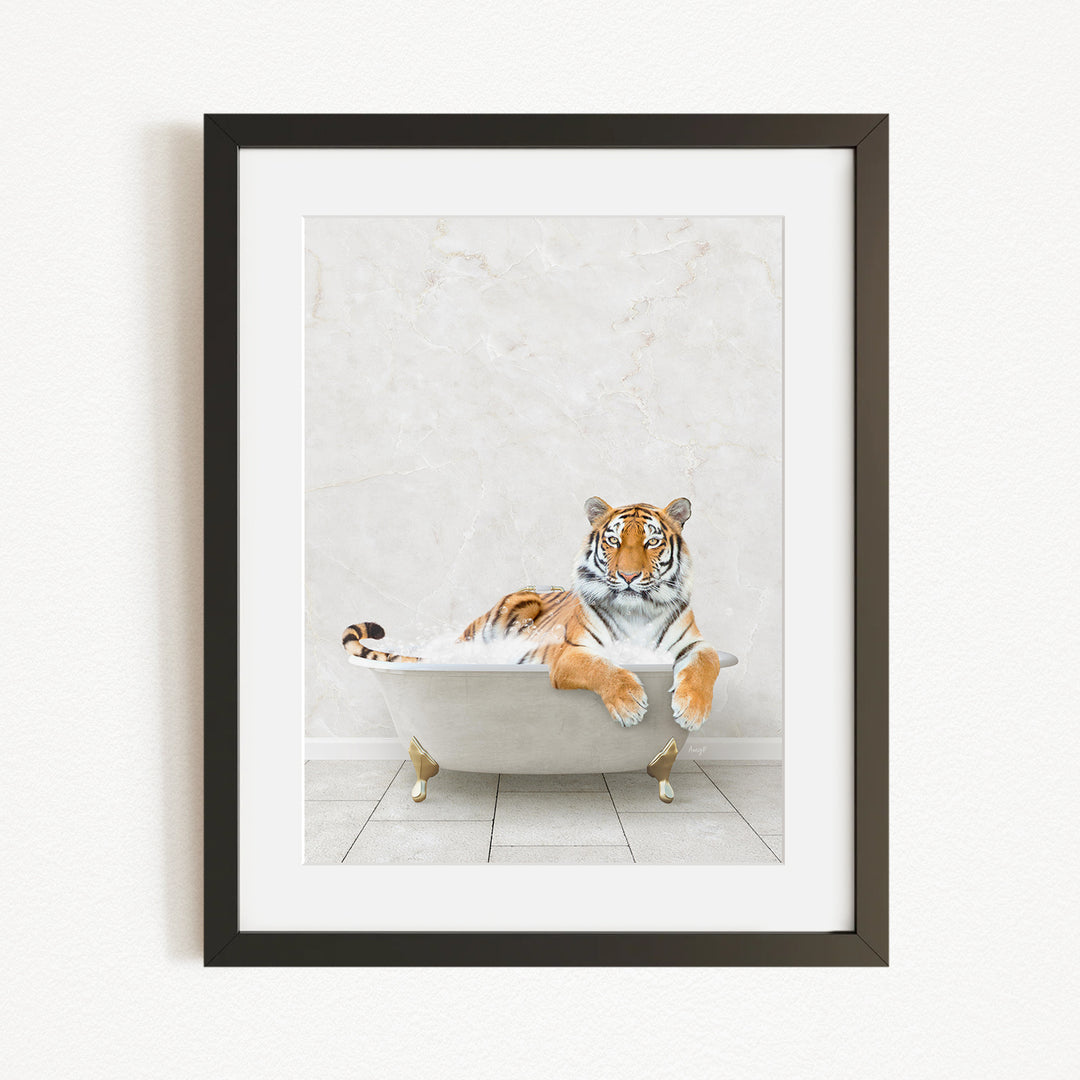 A tiger is sitting in a white bathtub, appearing relaxed and comfortable.