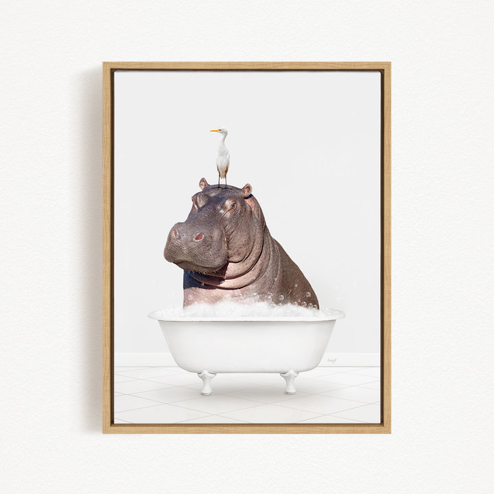 A large hippopotamus is sitting in a white bathtub, with a white bird perched on its head.