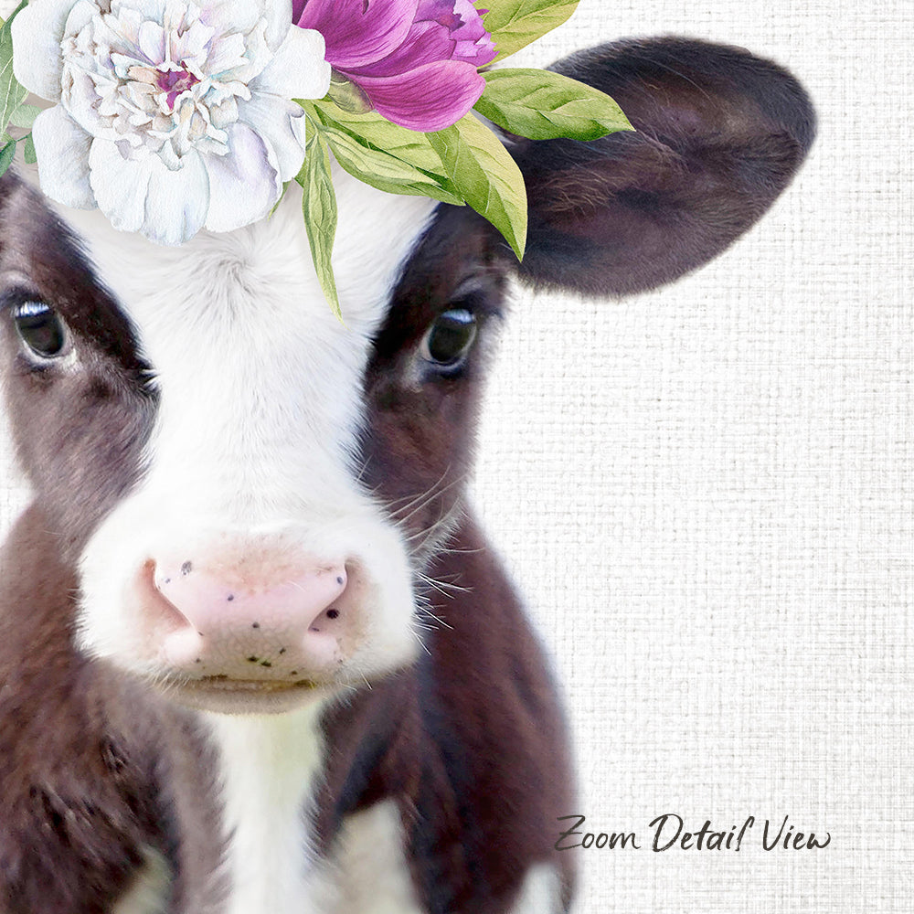 A close-up of a cow's face with a floral headpiece on its head, set against a white background.