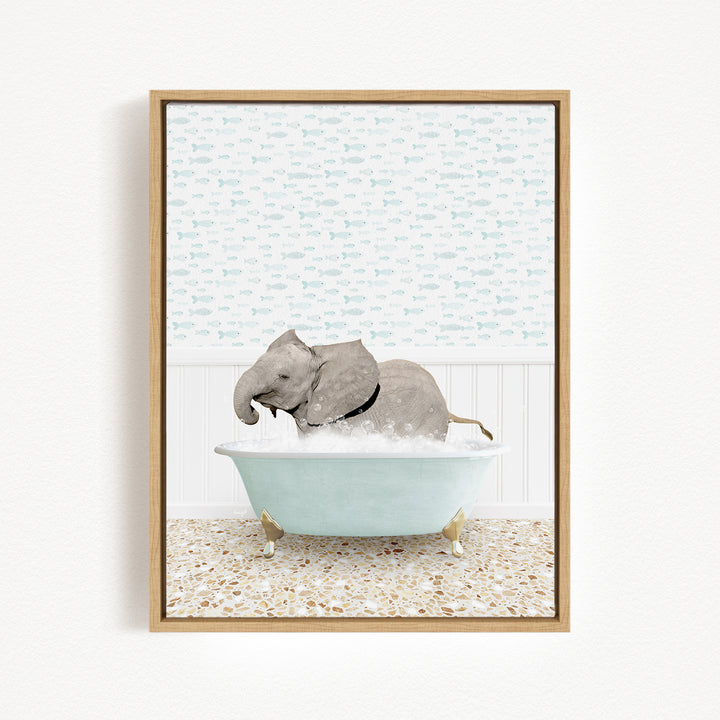 A gray elephant is sitting in a light blue bathtub filled with water, surrounded by a patterned wall and a tiled floor.