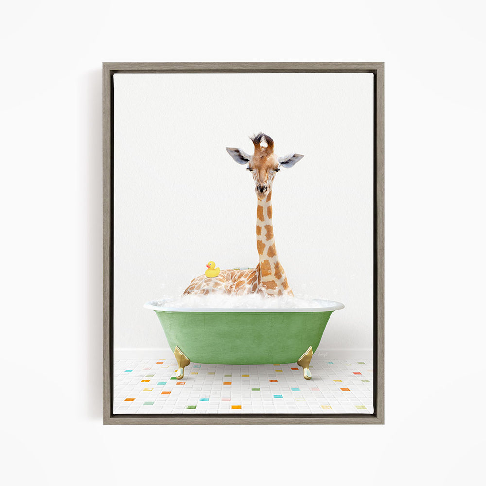 A giraffe is sitting in a green bathtub filled with bubbles, surrounded by a colorful tiled floor.