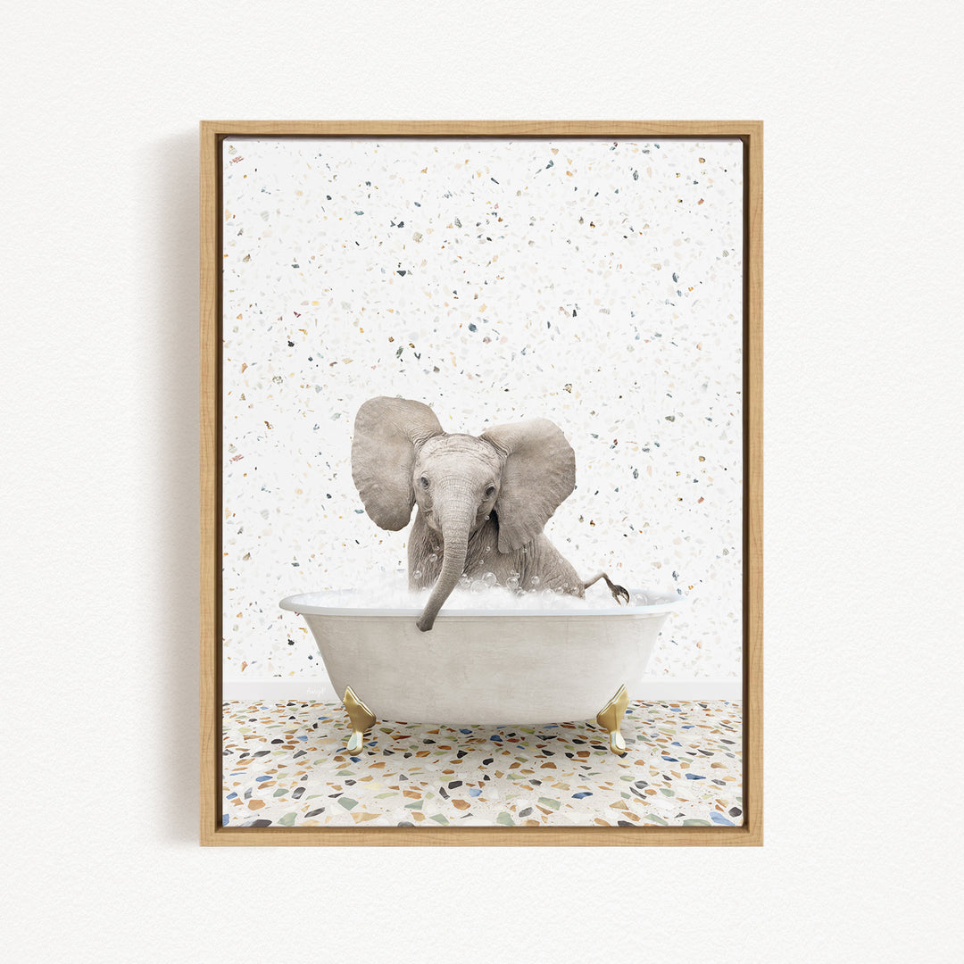 A gray elephant is sitting in a white bathtub filled with water, surrounded by a speckled pattern on the floor.