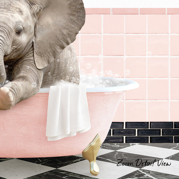 A baby elephant sitting in a pink bathtub, surrounded by bubbles and a white towel.
