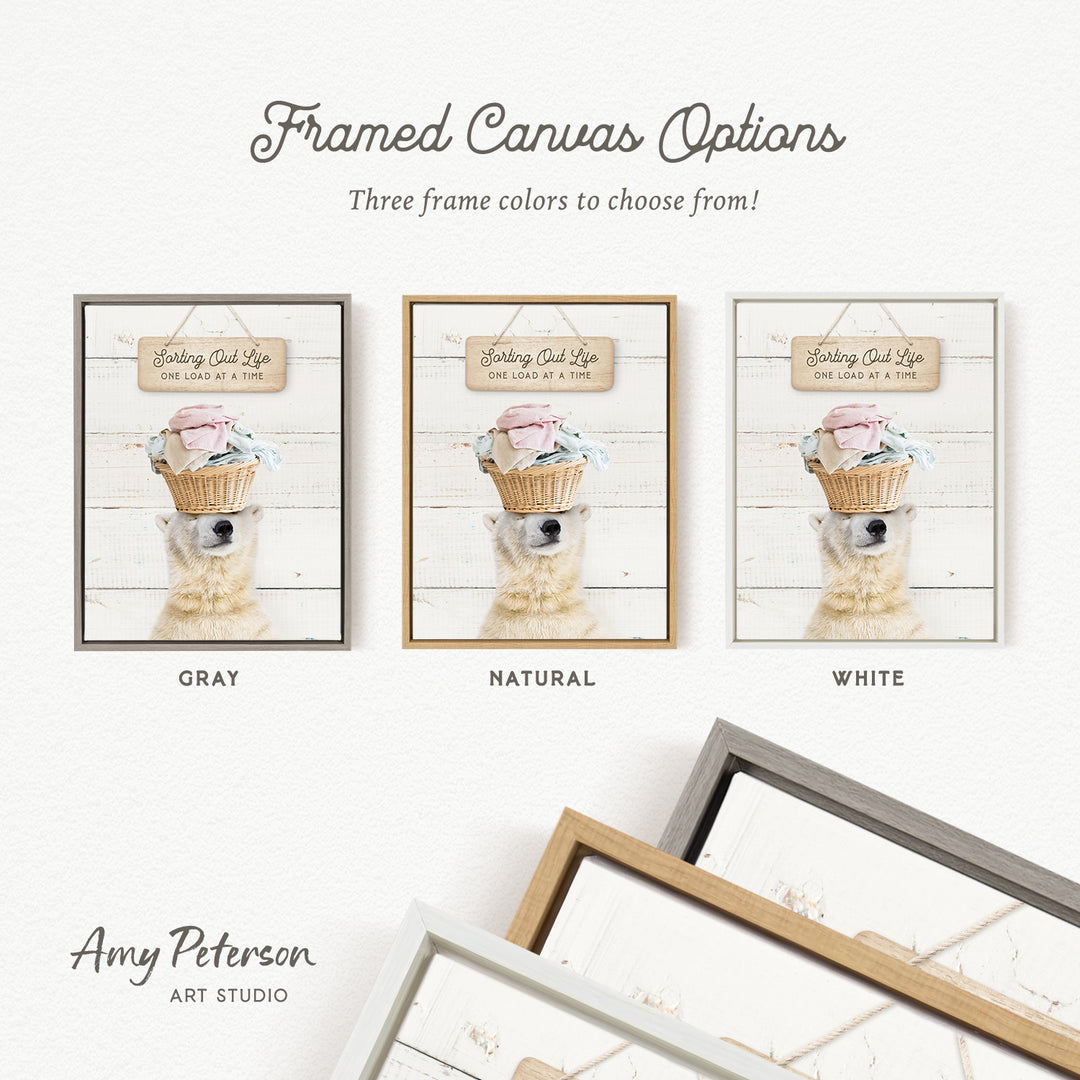 three framed canvas options, each featuring a different color and frame style. The options include a gray frame, a natural frame, and a white frame. The text above the options reads " Framed Canvas Options" and "Three frame colors to choose from!".
