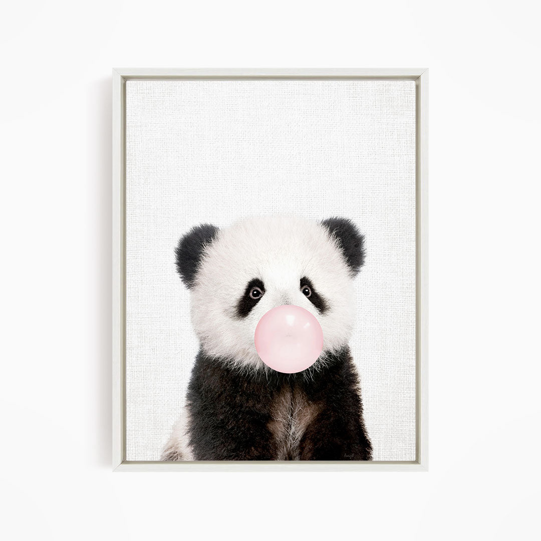 A cute panda bear blowing a bubble with a pink bubble gum bubble.