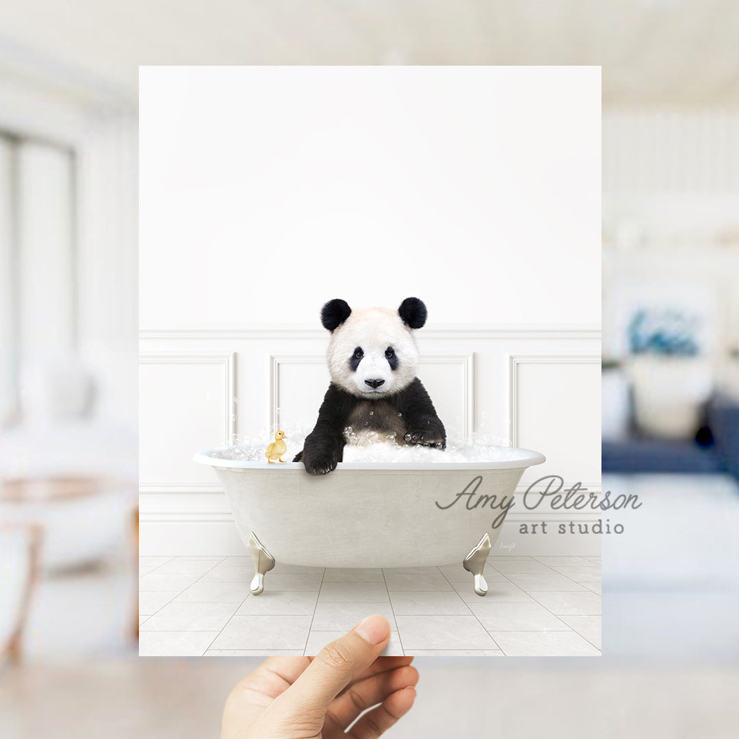 a panda bear sitting in a bath tub