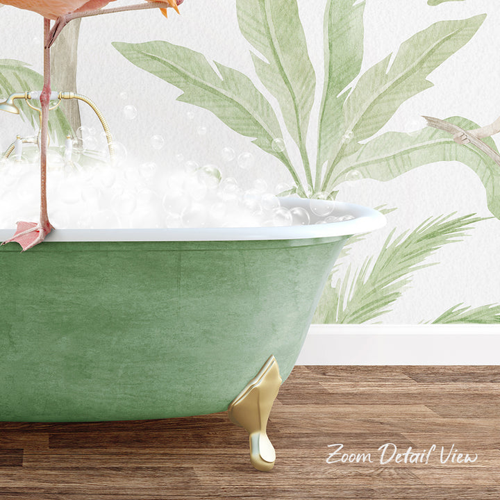 A green clawfoot bathtub filled with bubbles, set against a backdrop of a tropical plant wallpaper.