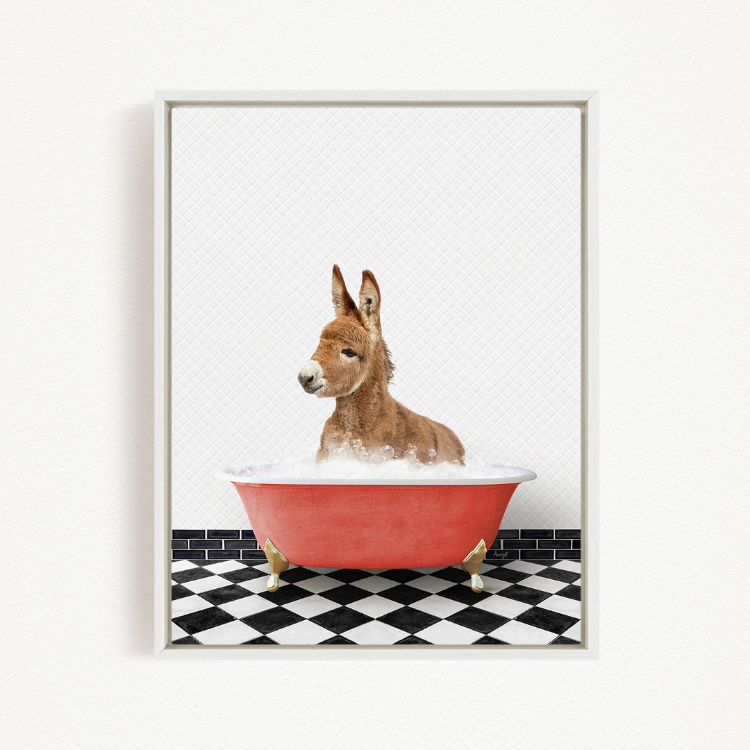 A donkey is sitting in a red bathtub filled with water, surrounded by a black and white checkered floor.