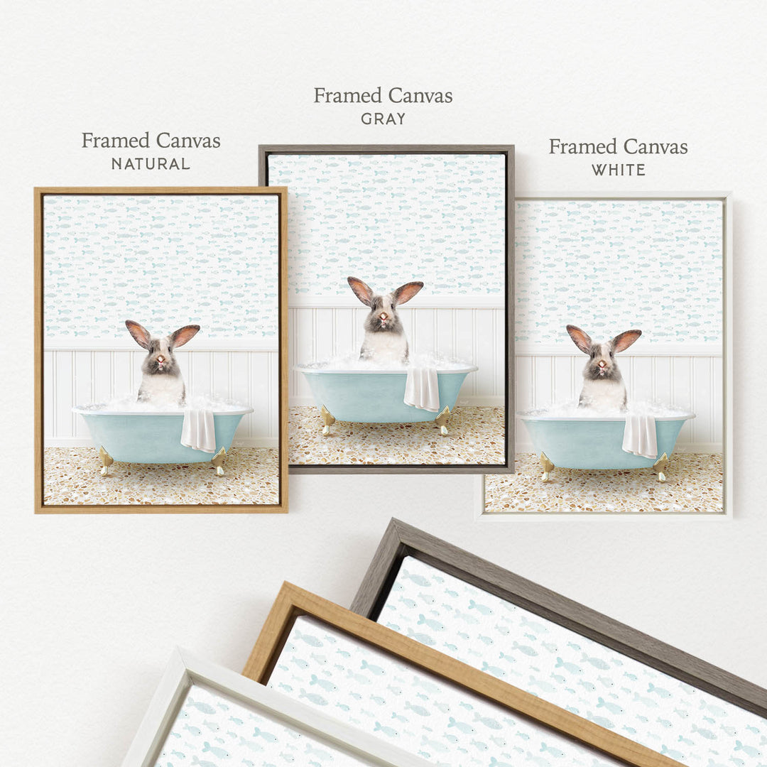 three framed pictures of a rabbit sitting in a bathtub, each with a different colored frame.