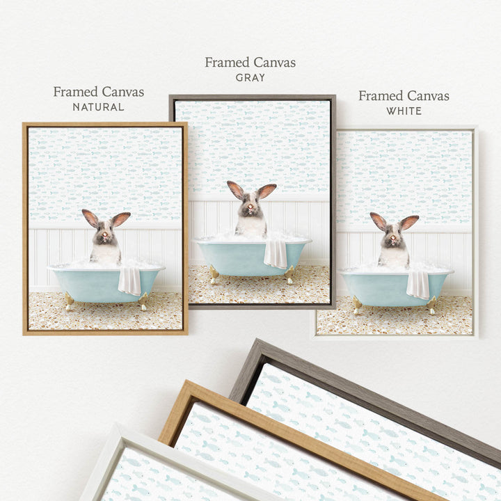 three framed pictures of a rabbit sitting in a bathtub, each with a different colored frame.