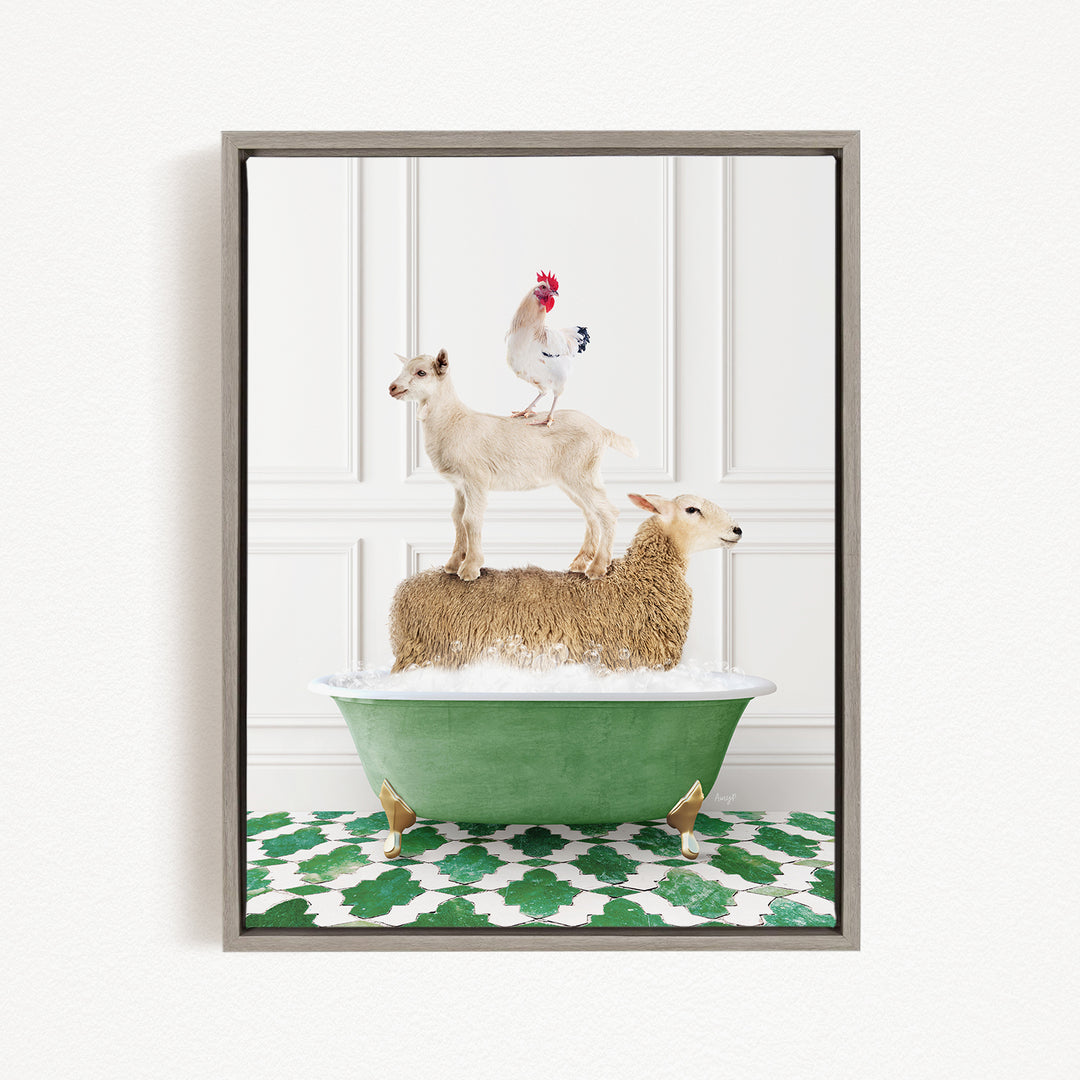 A framed image depicting a sheep standing on a goat's back, with a rooster perched on top of the goat, all atop a green bathtub.