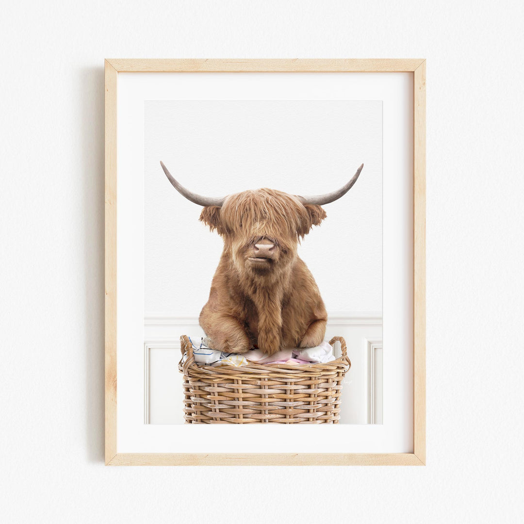 a picture of a brown cow sitting in a basket