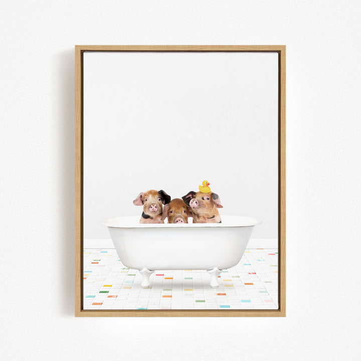 Three adorable pigs sitting in a white bathtub, each wearing a yellow hat.