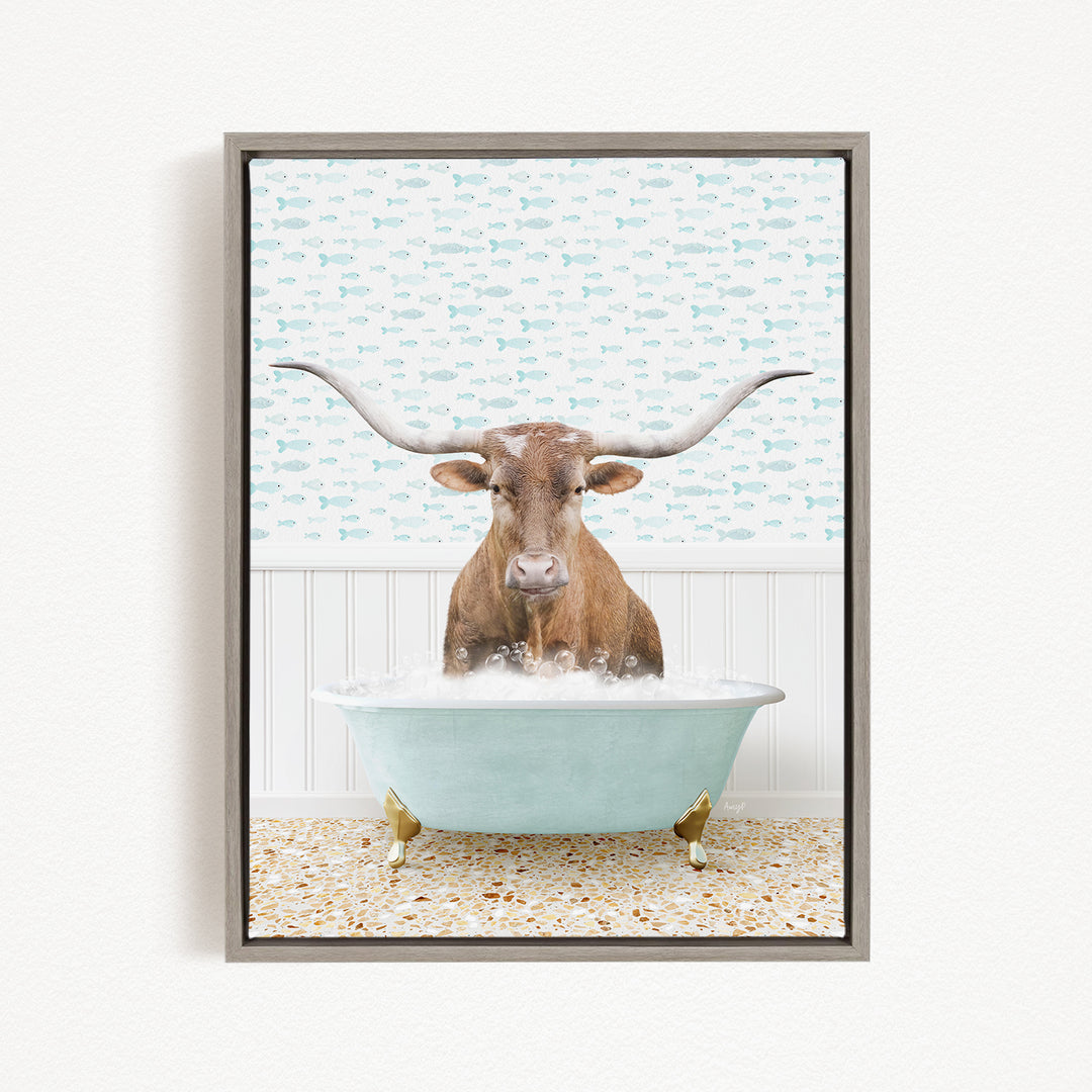A brown steer with large curved horns is sitting in a light blue bathtub filled with bubbles, creating a whimsical and playful scene.