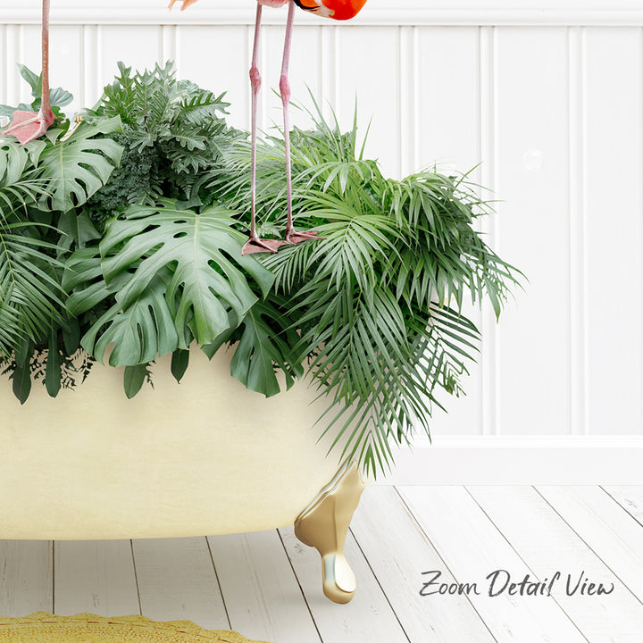 A large potted plant with lush green leaves and a pink flamingo standing on the edge of the tub, set against a white wall.