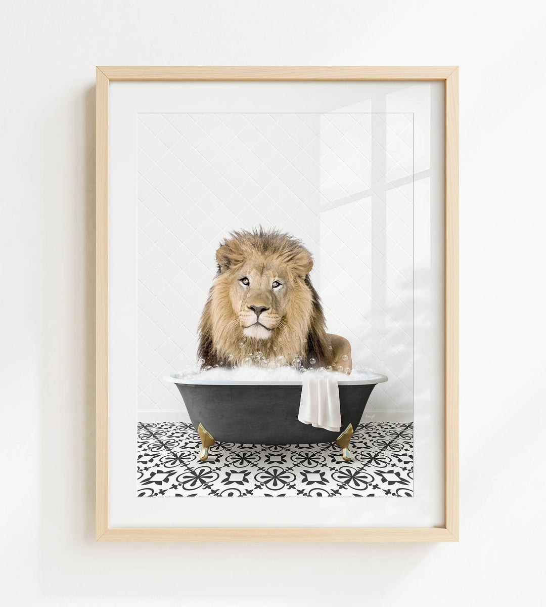 A lion sitting in a bathtub filled with bubbles, looking directly at the camera.