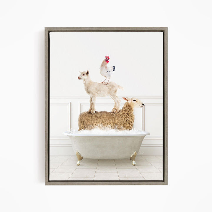 A framed image depicting a white goat standing on a sheep in a bathtub, with a rooster perched on top of the sheep.