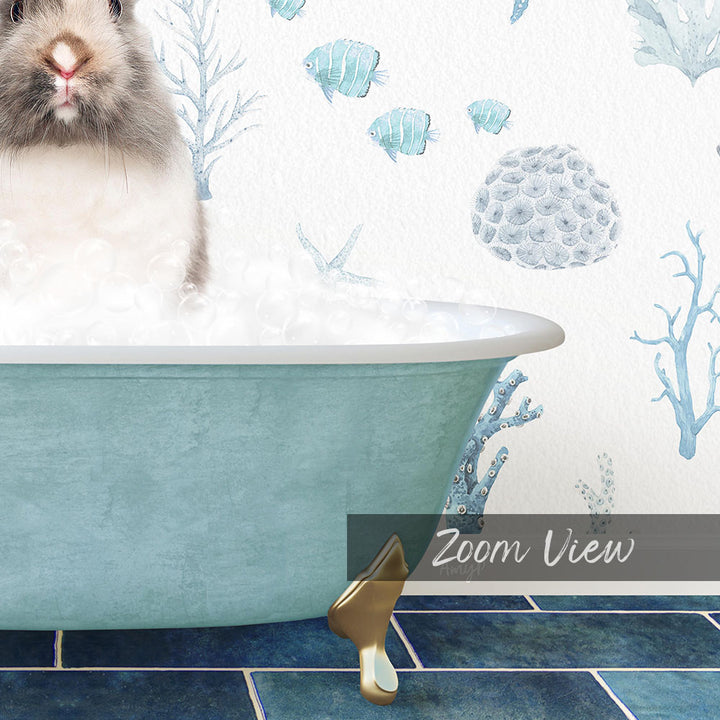 A small rabbit is sitting in a bathtub filled with bubbles, surrounded by a blue and white underwater scene with fish and coral.