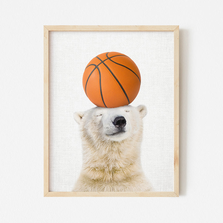 a polar bear balancing a basketball on its head