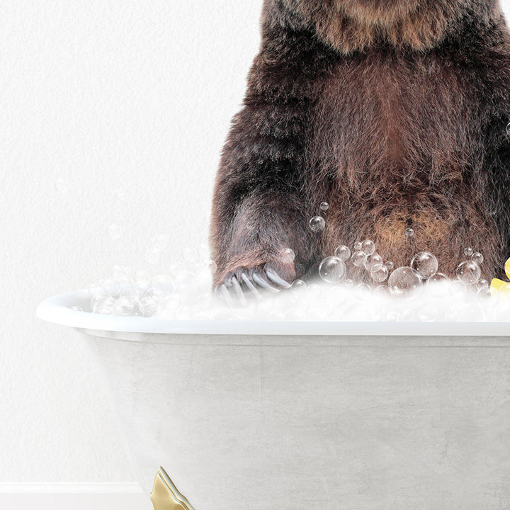 a brown bear sitting in a bathtub with bubbles