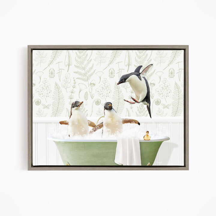 A framed image depicting three penguins sitting in a green bathtub, with one penguin flying towards the tub.