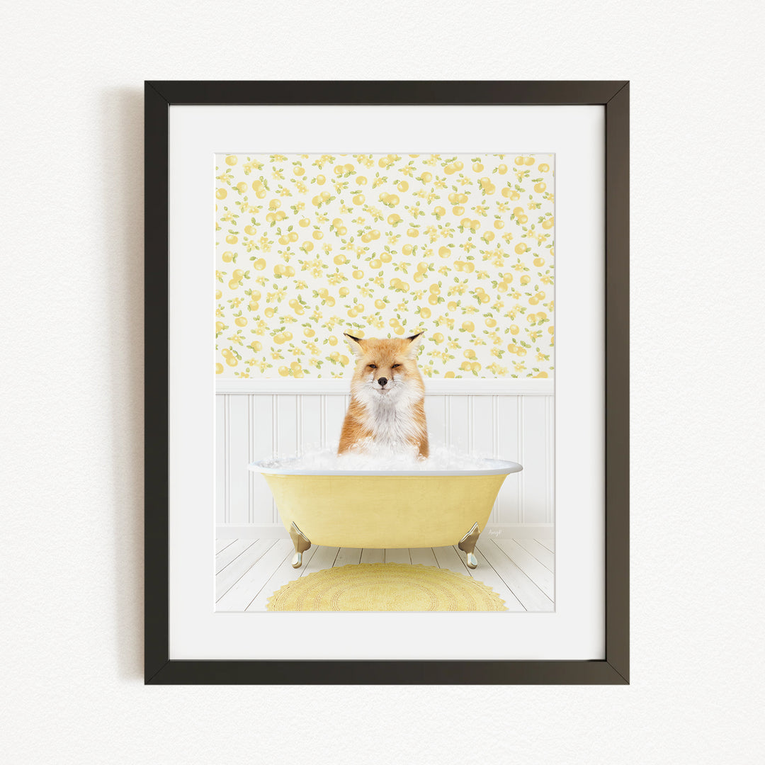 A fox is sitting in a yellow bathtub, surrounded by a yellow floral wallpaper.