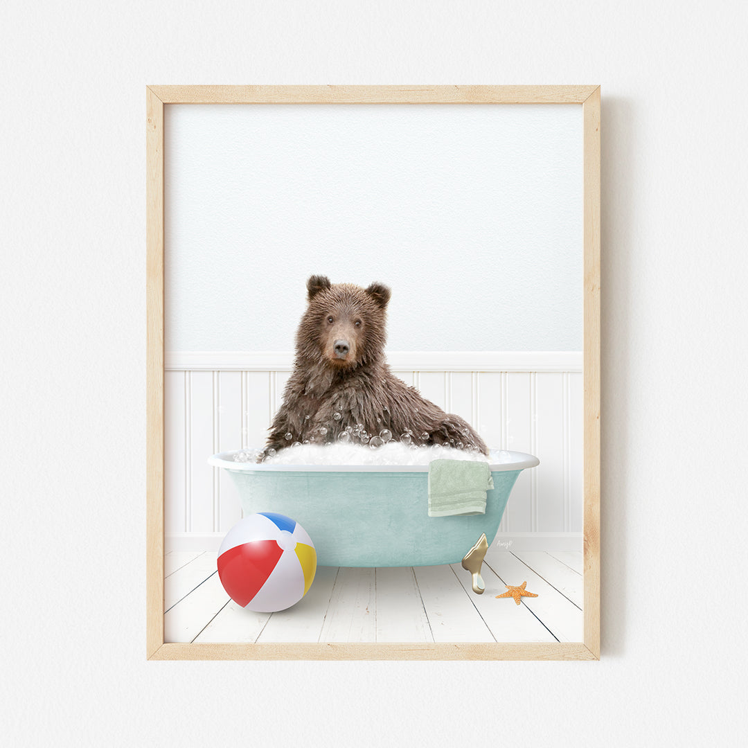 a picture of a bear in a bathtub with a beach ball