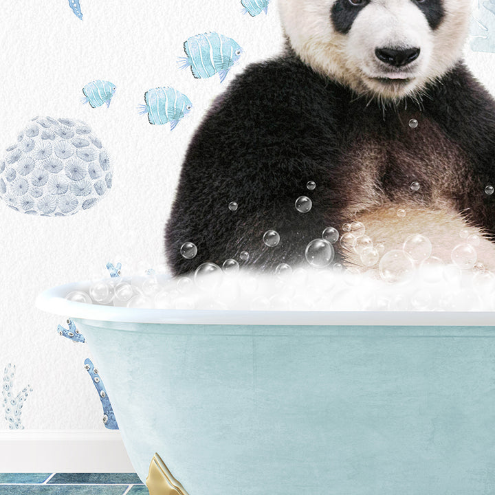 a panda bear sitting in a bathtub full of bubbles