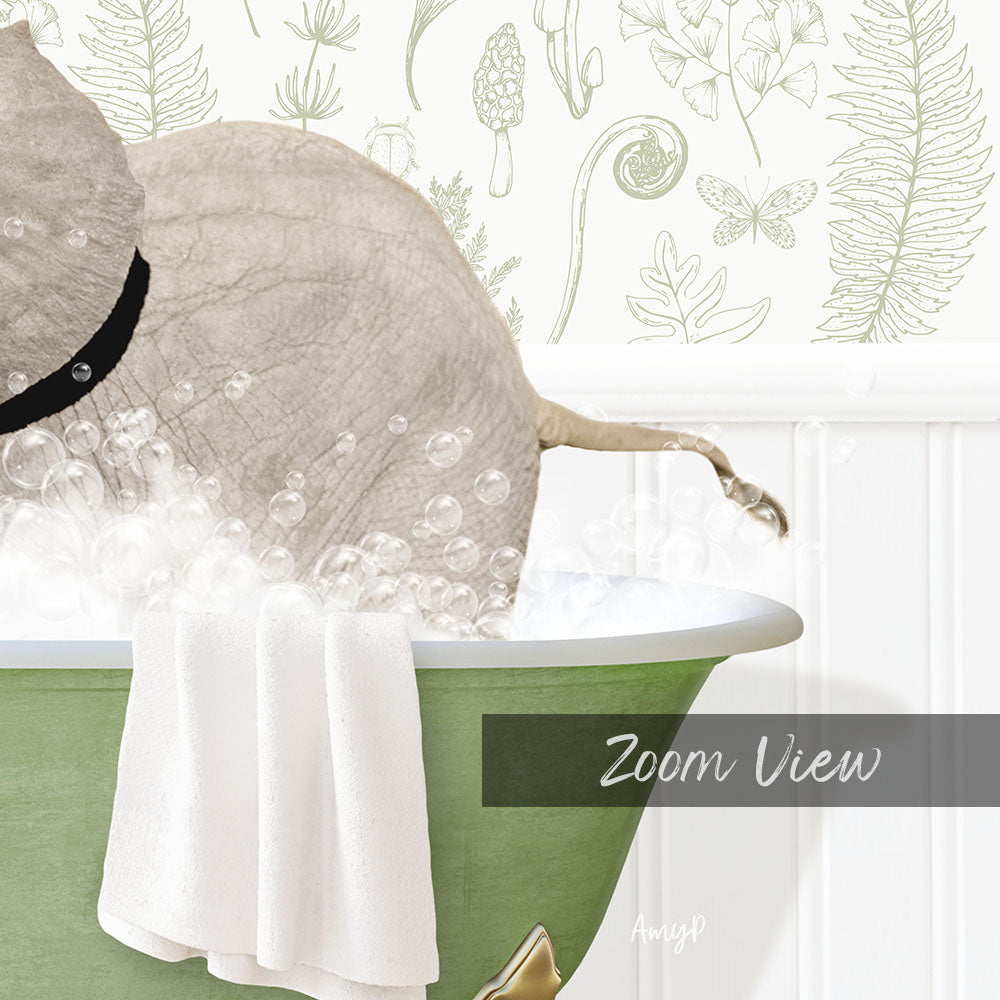 A large elephant is taking a bath in a green bathtub, surrounded by bubbles and a towel.