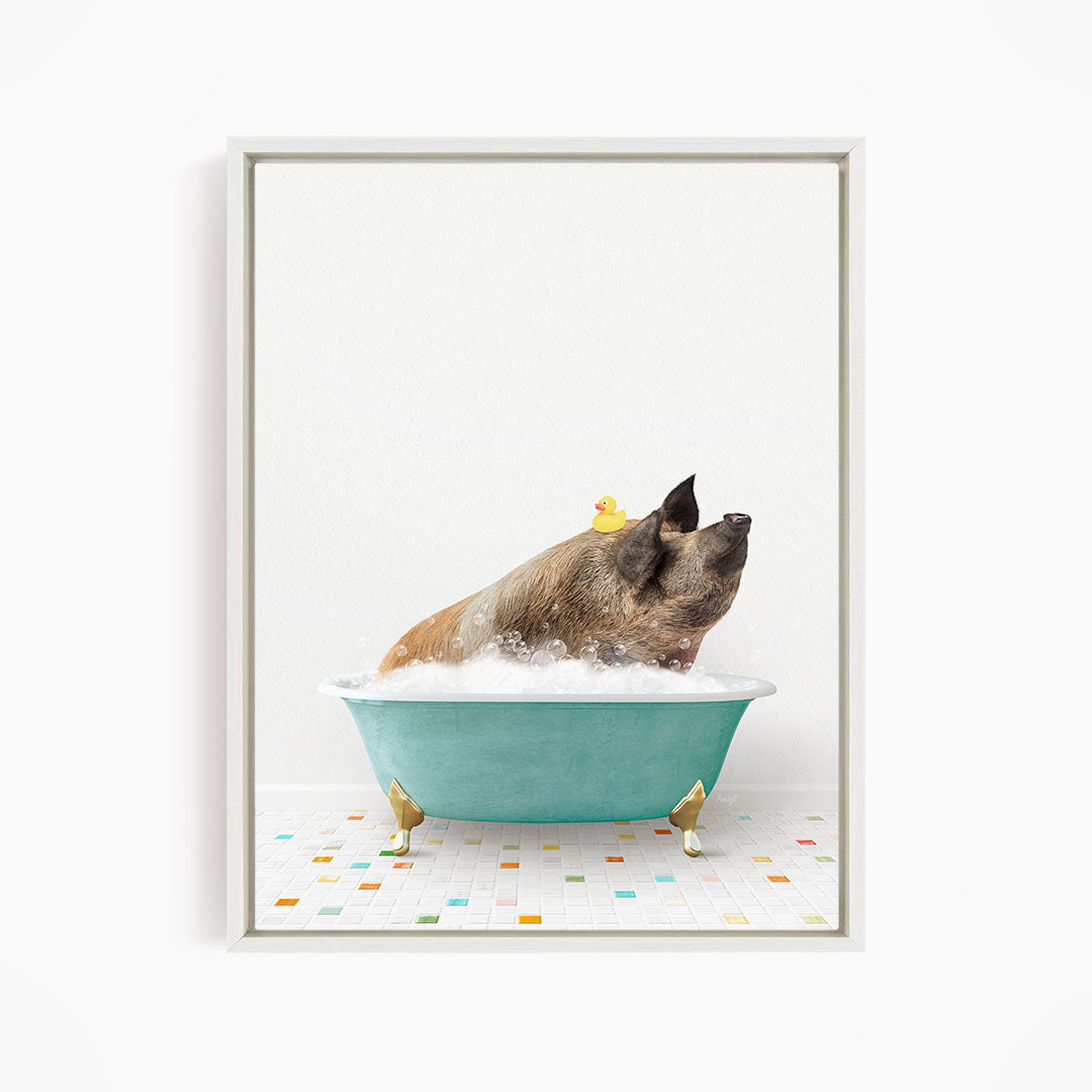A dog is sitting in a blue bathtub filled with bubbles, with a rubber duck floating on the water.