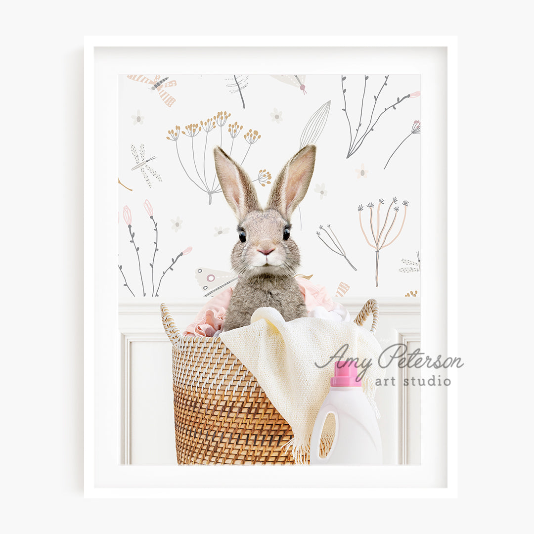 a picture of a rabbit sitting in a basket