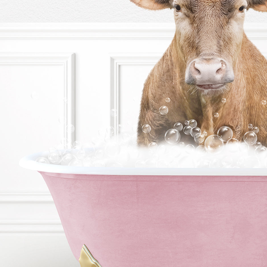 a cow is sitting in a bathtub with bubbles