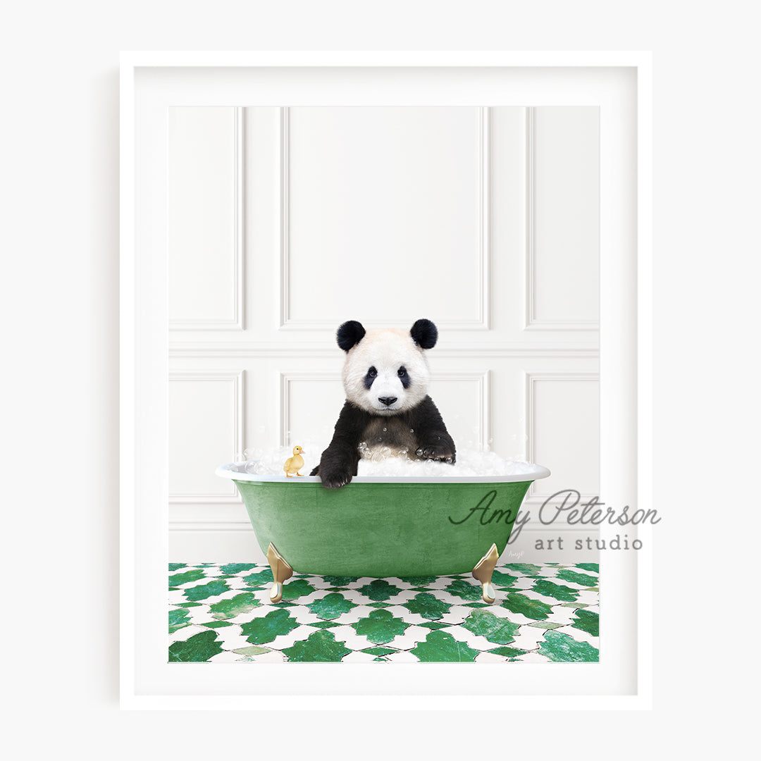 a panda bear sitting in a green bath tub