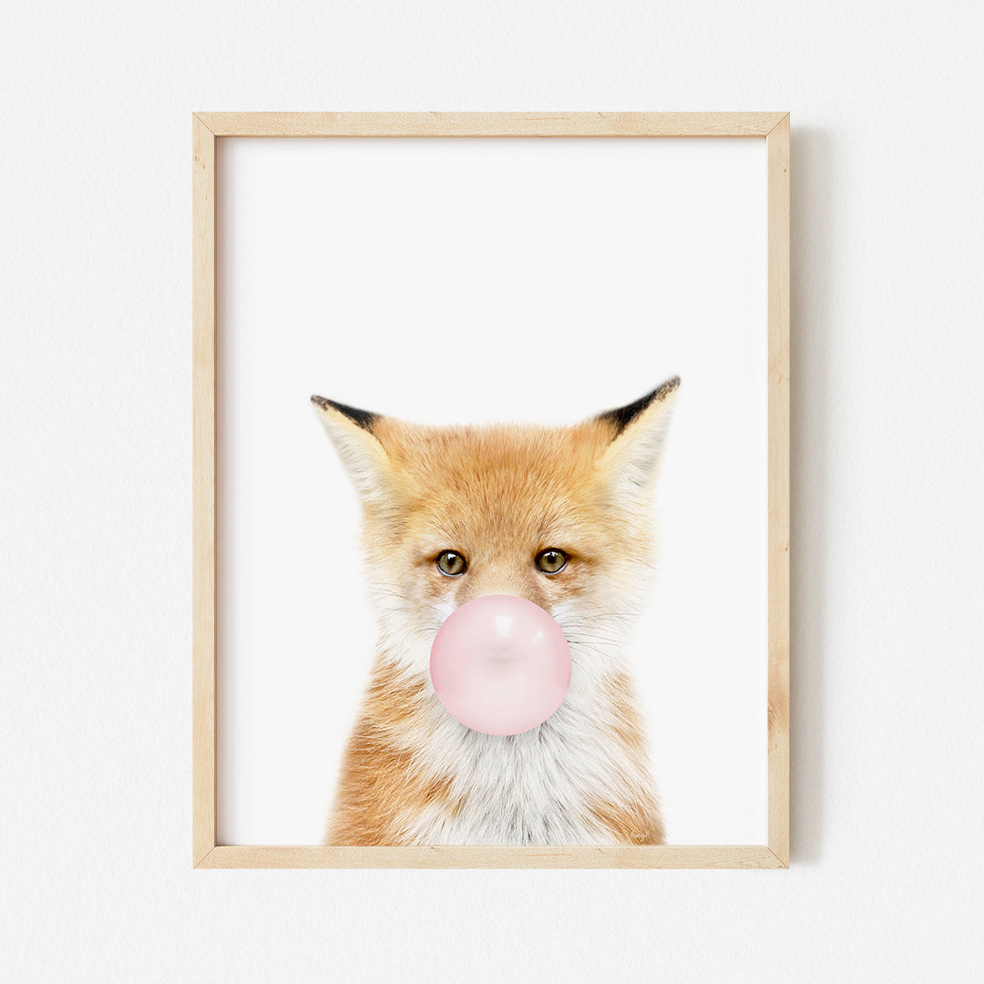 a picture of a fox with a bubble in its mouth