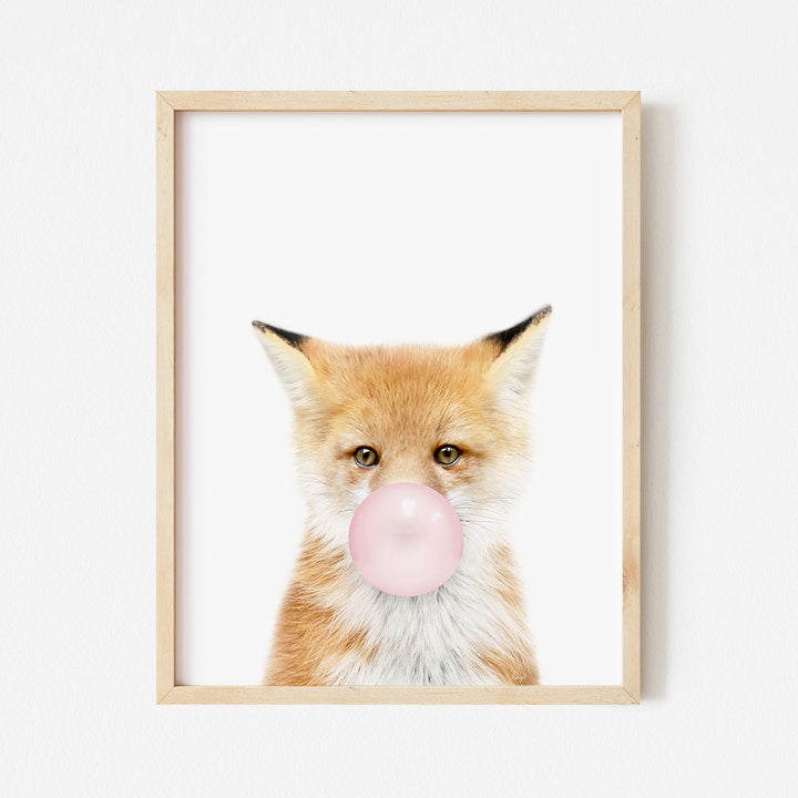 a picture of a fox with a bubble in its mouth