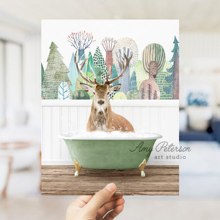 a person holding a card with a deer in a bathtub