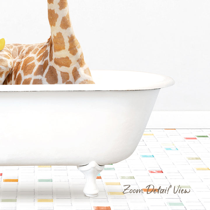 A giraffe is sitting in a white bathtub, with a colorful tiled floor in the background.