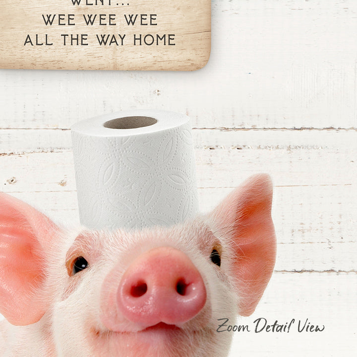 A pig with a roll of toilet paper on its head, with the text "Went... Wee Wee Wee All the Way Home" above it.