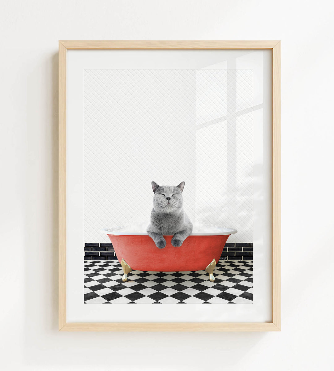 A gray cat sitting in a red bathtub with black and white checkered flooring.