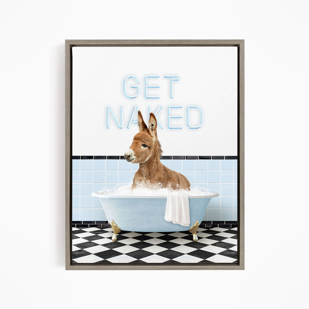 A donkey is sitting in a bathtub filled with bubbles, with the text "GET NAKED" displayed above it.
